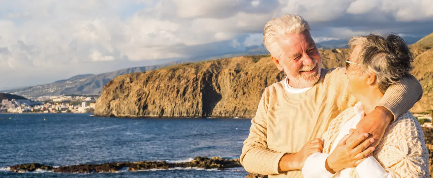 Healthy elderly couple at the coast