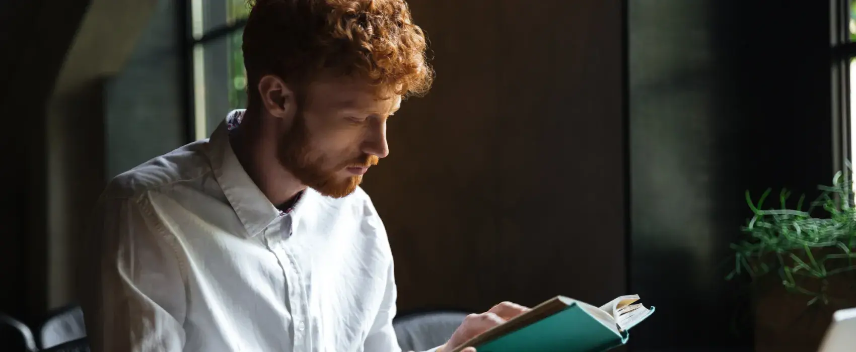 Ginger man reading