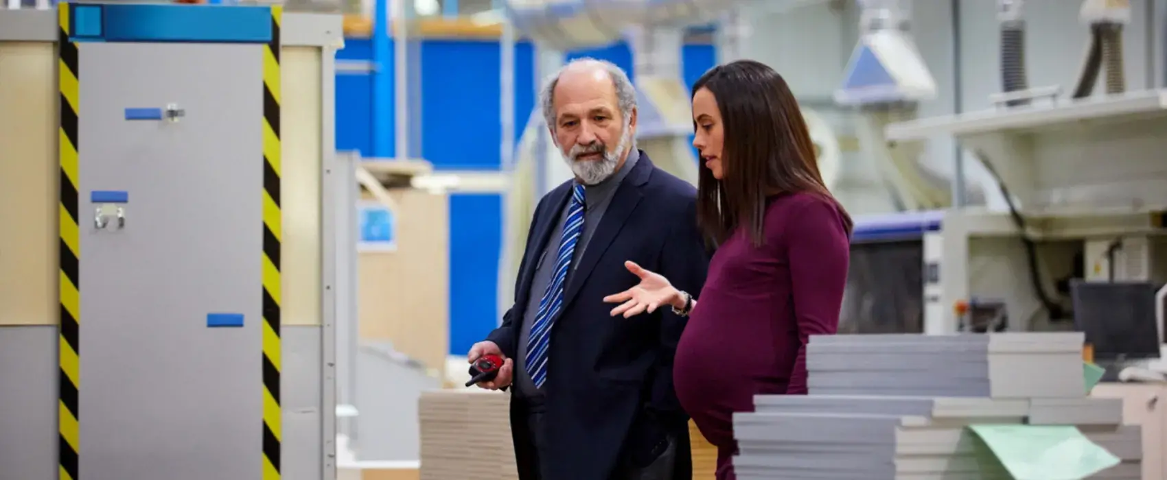 Pregnant worker in a warehouse