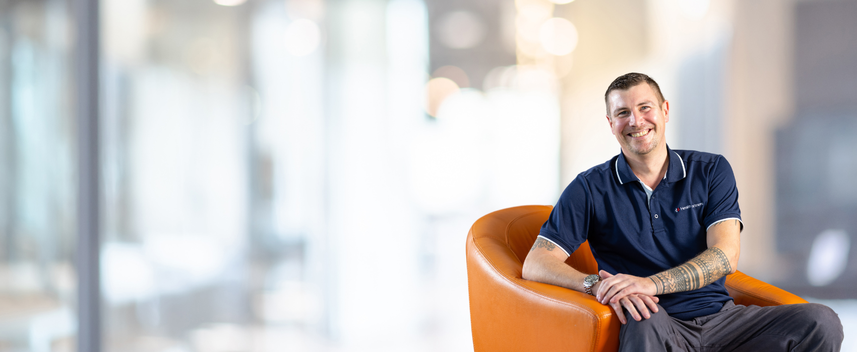 Man sitting on a chair in an office